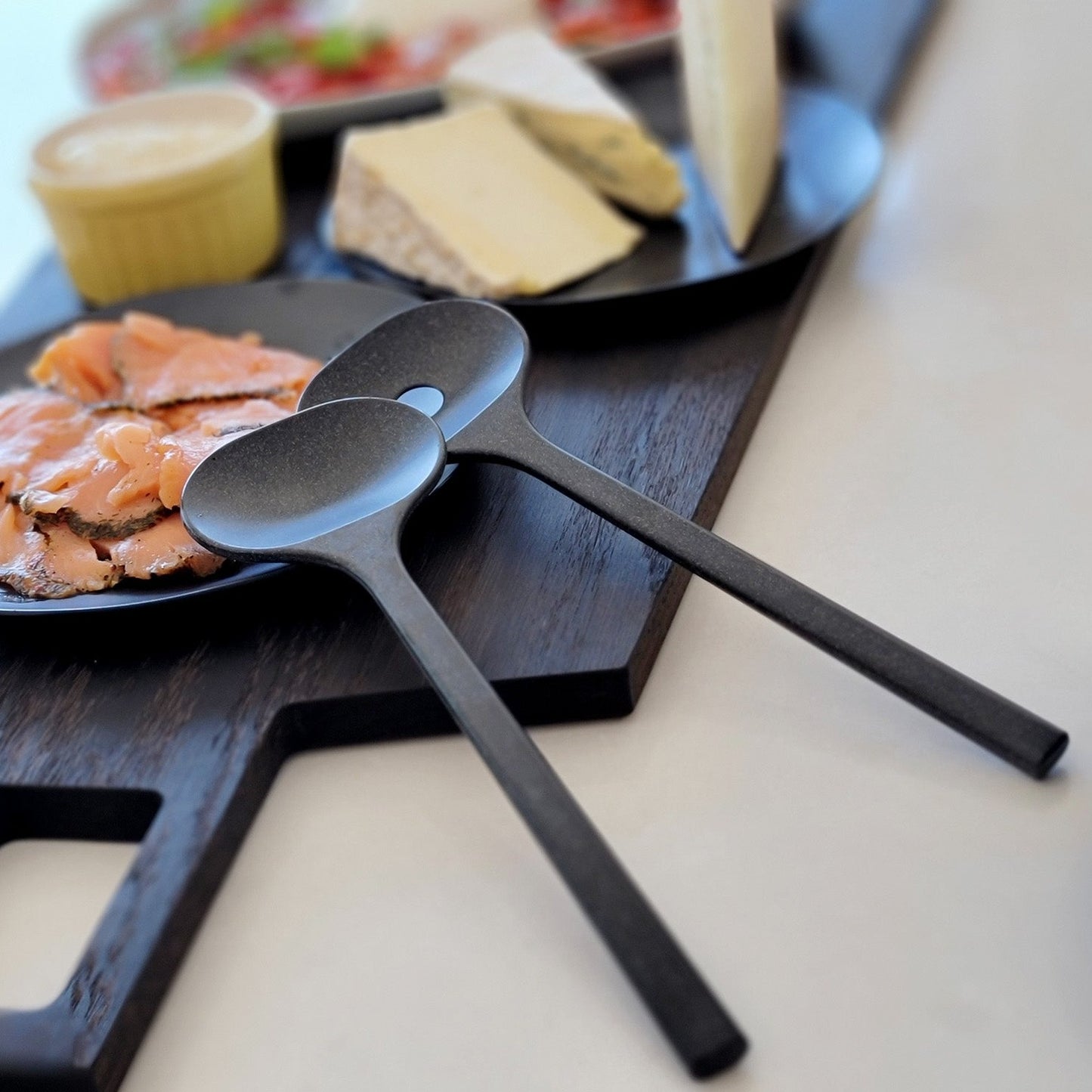 Oversized, blackened oak, food grade charcuterie boards. Ideal for serving many people at once. Uniquely designed by Big Wide Outside.