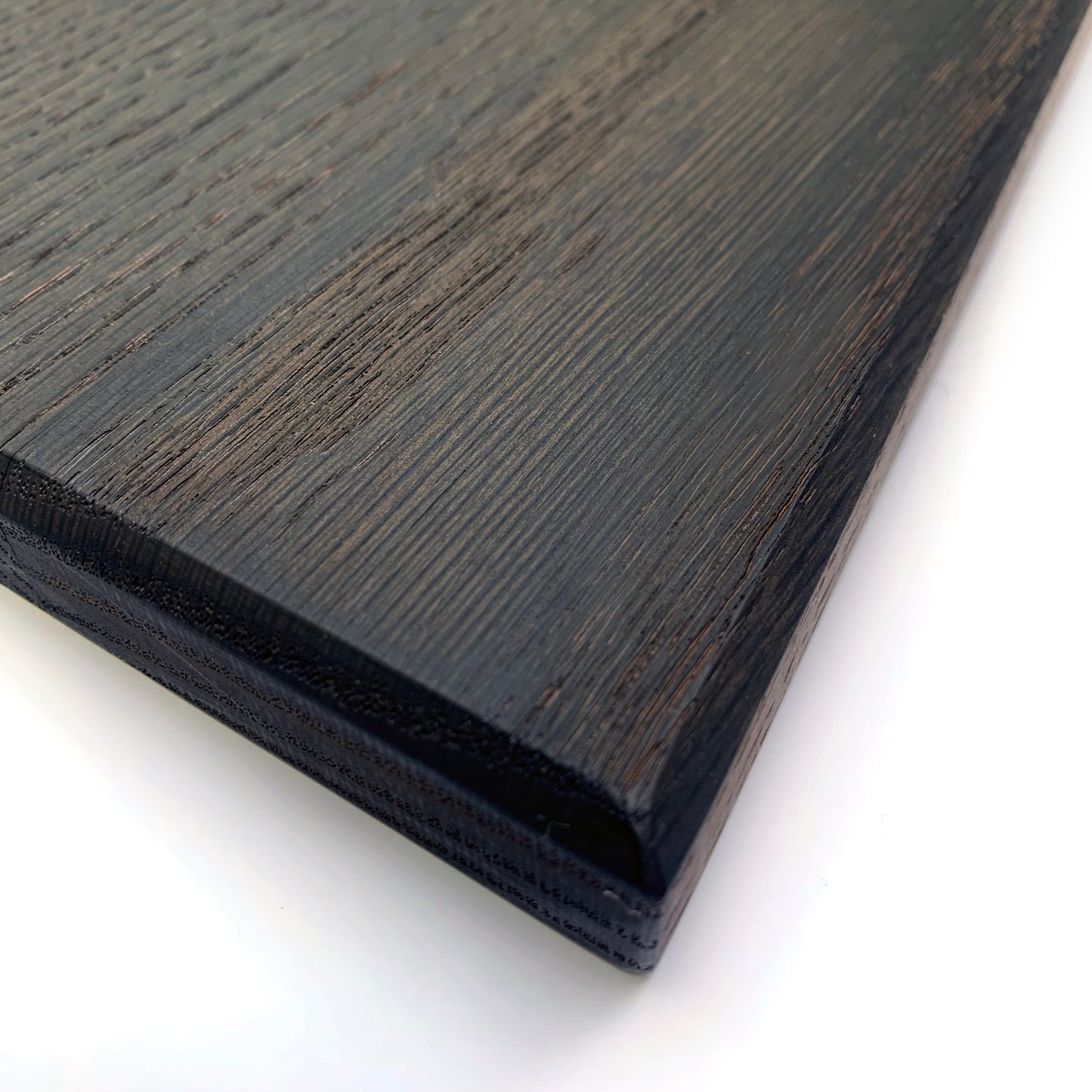 Oversized, blackened oak, food grade charcuterie boards. Ideal for serving many people at once. Uniquely designed by Big Wide Outside.