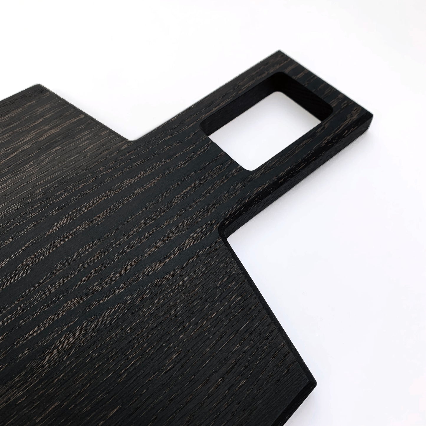 Oversized, blackened oak, food grade charcuterie boards. Ideal for serving many people at once. Uniquely designed by Big Wide Outside.