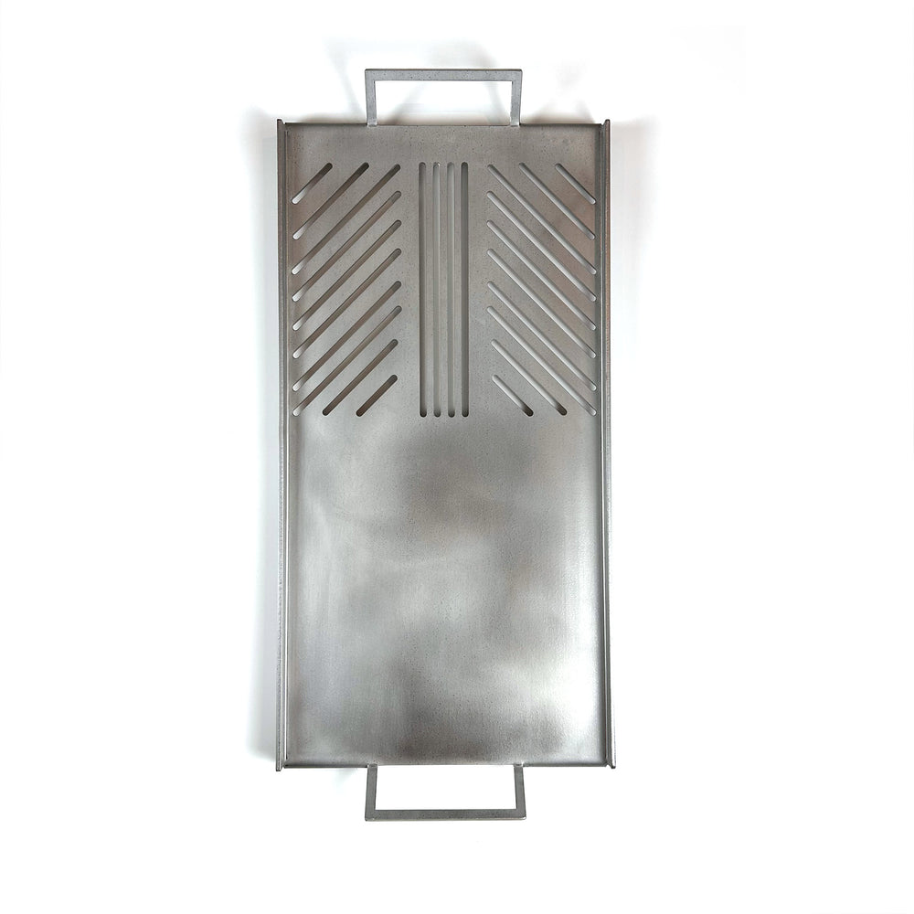 Stainless steel grill plate shown here on a white background.