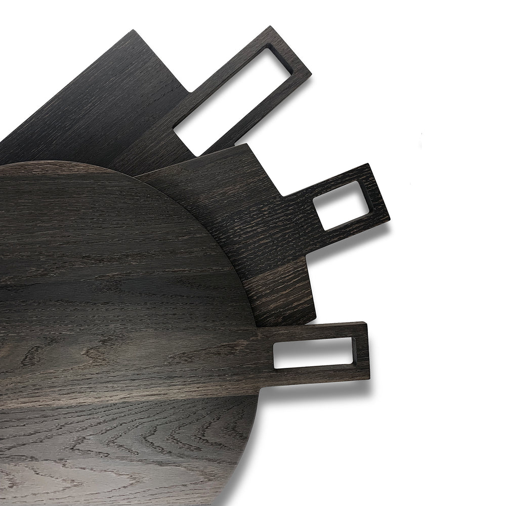 
                  
                    Oversized, blackened oak, food grade charcuterie boards. Ideal for serving many people at once. Big Wide Outside. Comes in three styles, Full Circle, Oblong and Taper.
                  
                