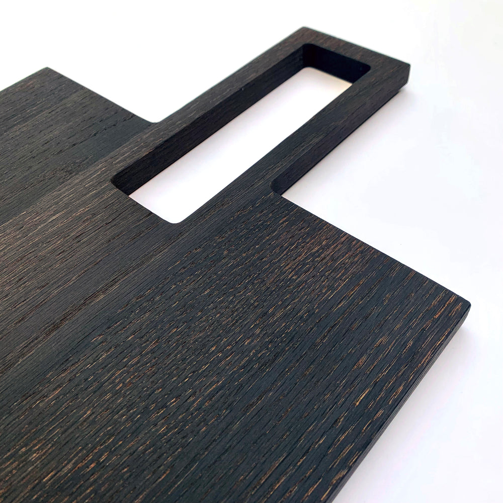 
                  
                    Oversized, blackened oak, food grade charcuterie boards. Ideal for serving many people at once. Uniquely designed by Big Wide Outside. 
                  
                