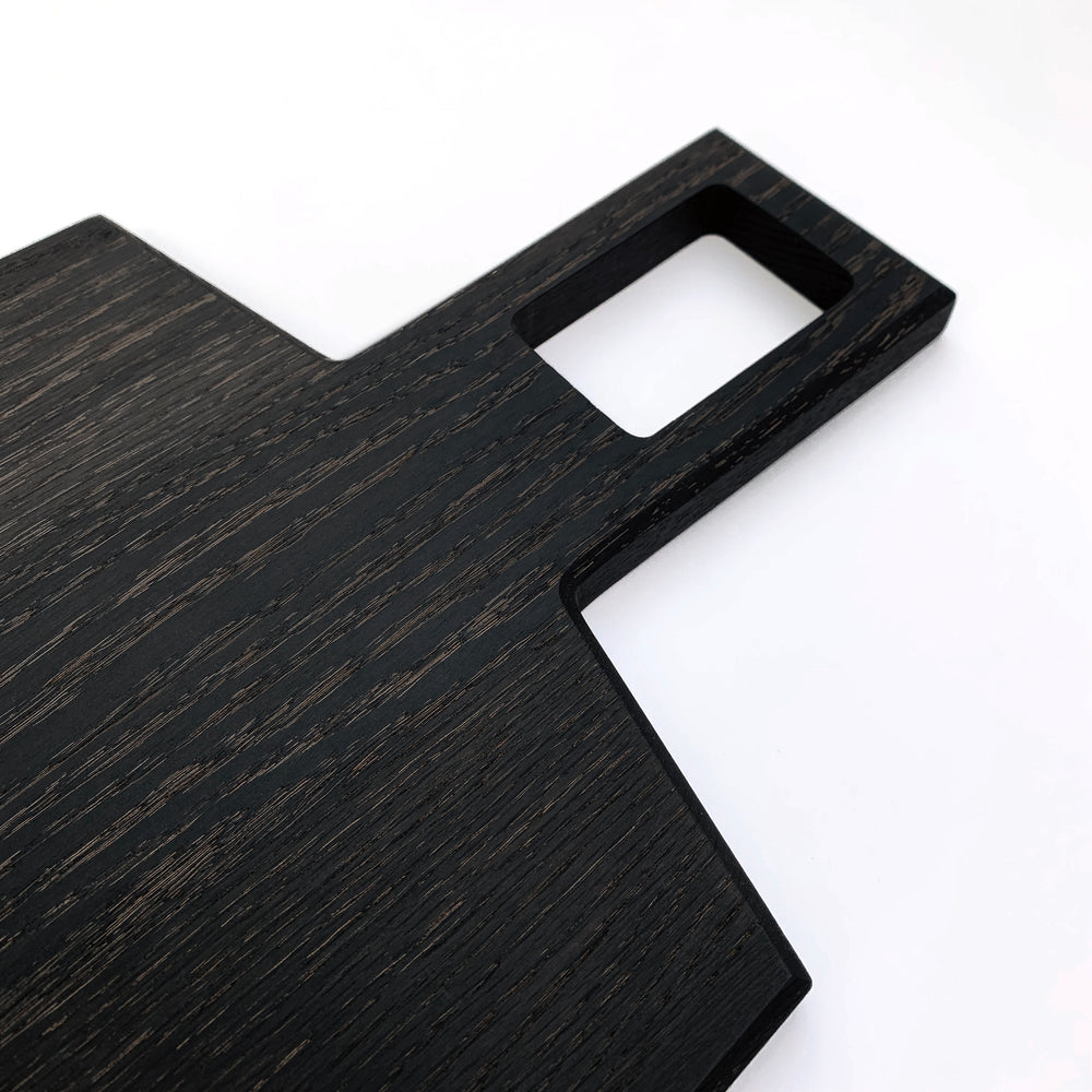 
                  
                    Oversized, blackened oak, food grade charcuterie boards. Ideal for serving many people at once. Uniquely designed by Big Wide Outside. 
                  
                