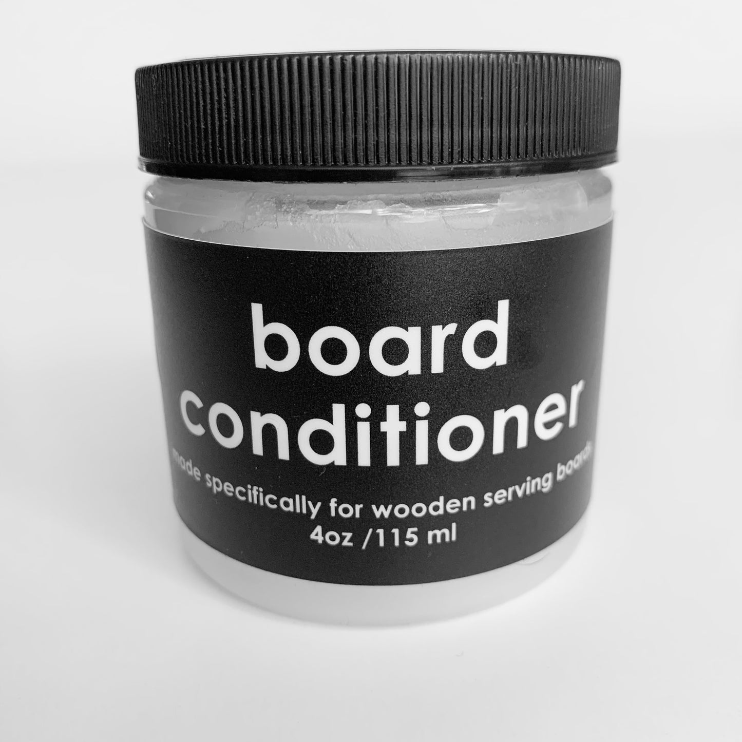 This image shows the Serving Board Conditioner packaging that keeps your wooden boards in great shape. 